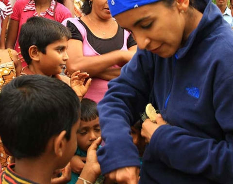 a lady with group of children